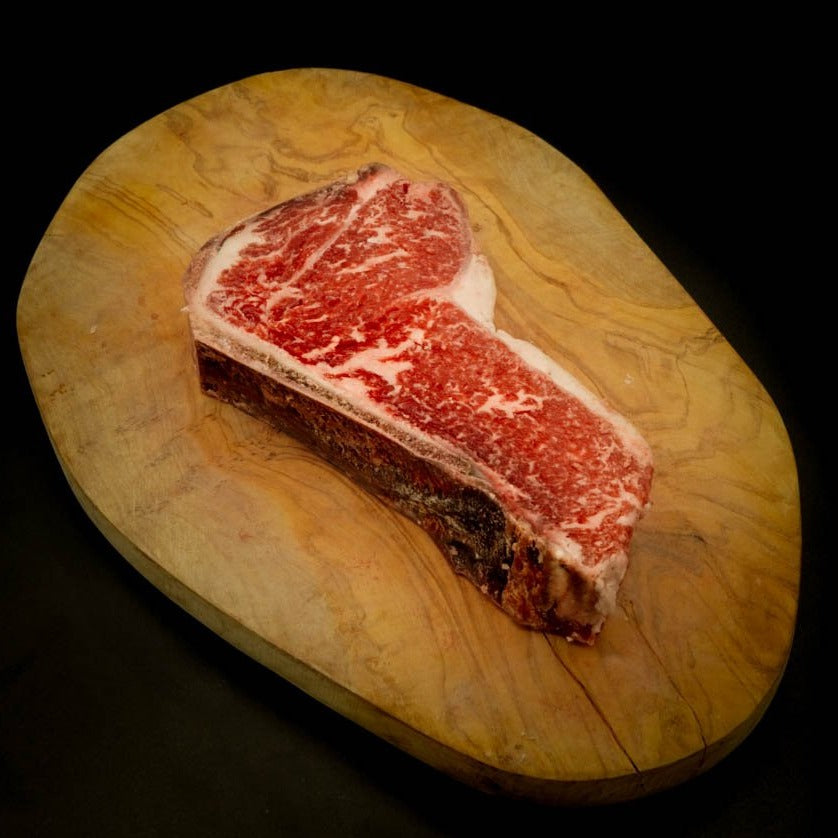 Dry Aged Bone In Strip Steak - The Butcher Shoppe